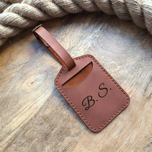 Personalized leather luggage tag. Custom luggage tag with name, initials, logo, phone number.