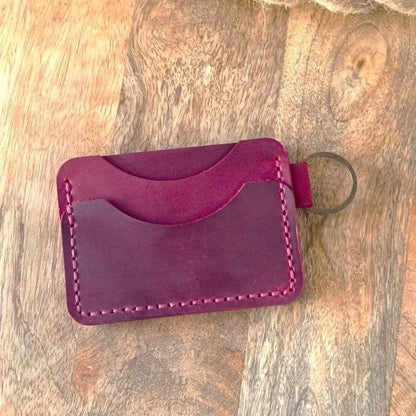 Personalized leather wallet with key ring. Slim, handmade wallet in burgundy leather with engraving of name, initials, etc.