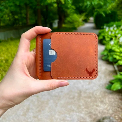 Men's handmade brown leather wallet with money clip, crafted from genuine leather with two credit card pockets