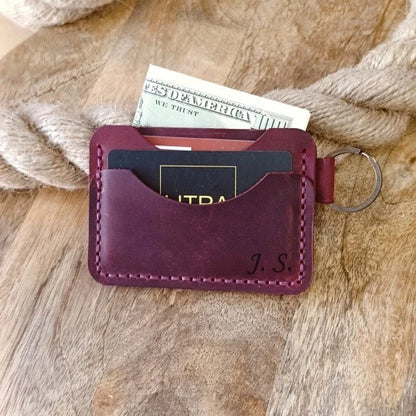 Personalized leather wallet with key ring. Slim, handmade wallet in burgundy leather with engraving of name, initials, etc.