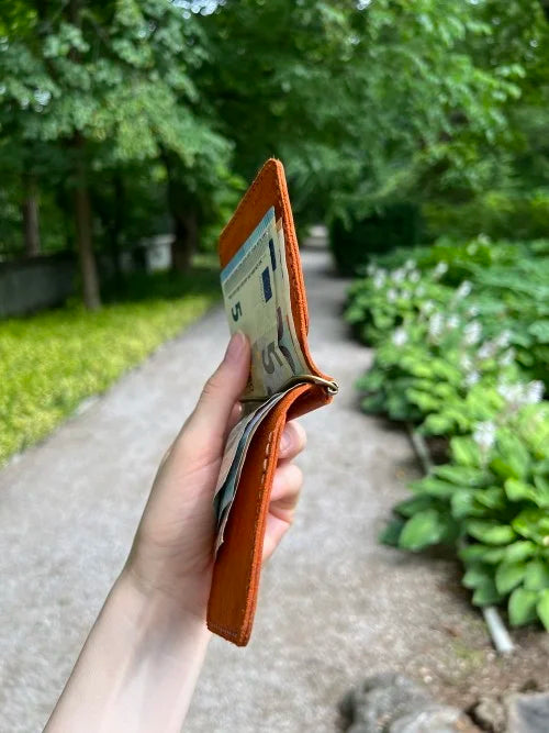 Men's handmade brown leather wallet with money clip, crafted from genuine leather with two credit card pockets